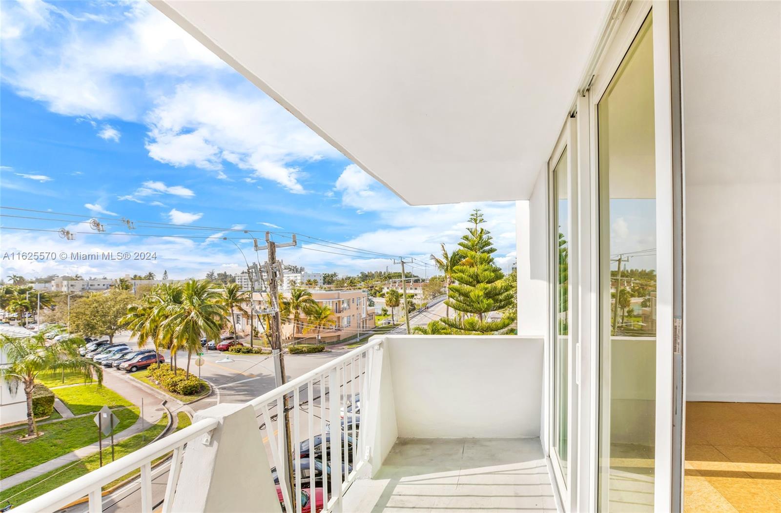 a view of a balcony with an ocean view