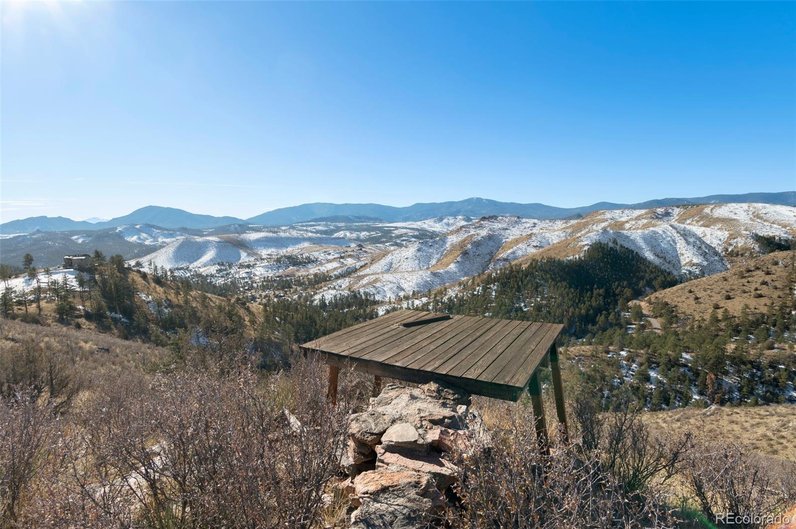 a view of a mountain from a balcony