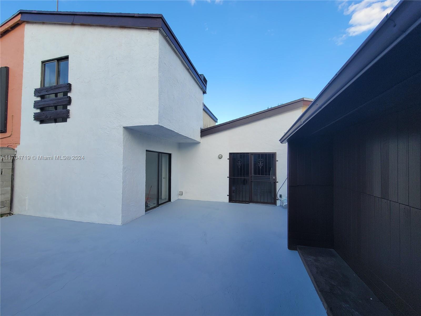 a view of a house with an empty space