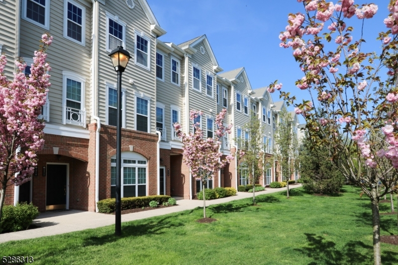 front view of a building with a yard