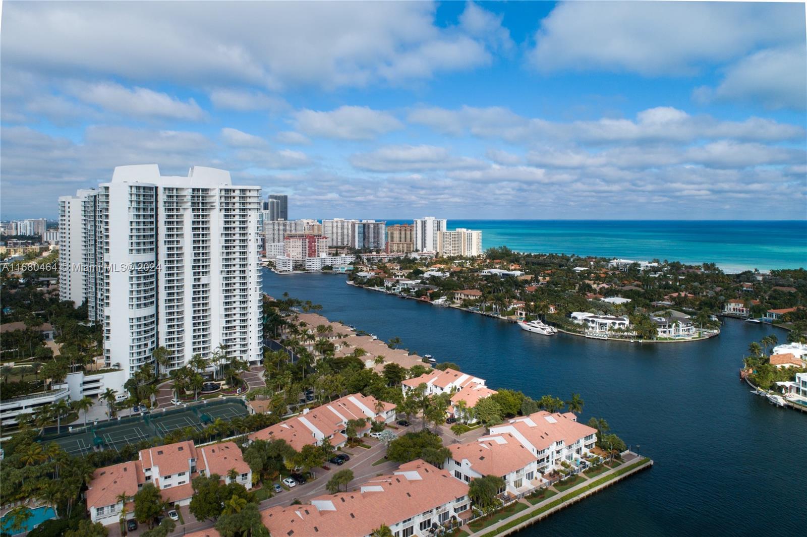 an aerial view of lake and city