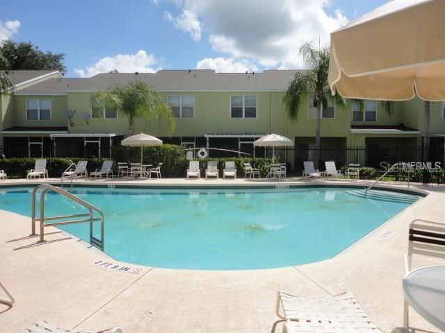 a view of a house with swimming pool