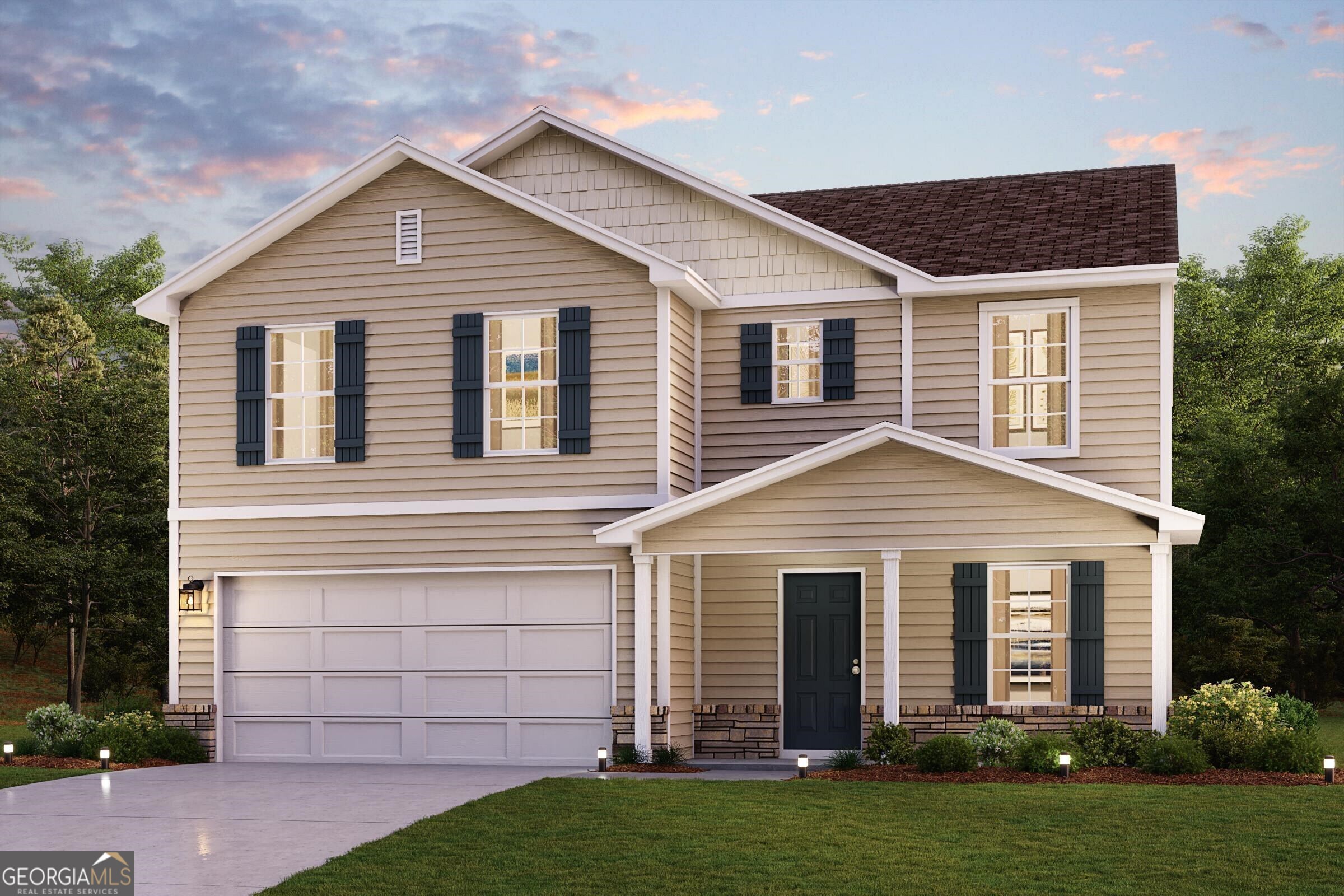 a front view of a house with a yard and garage