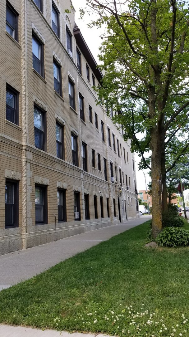 a view of building with garden