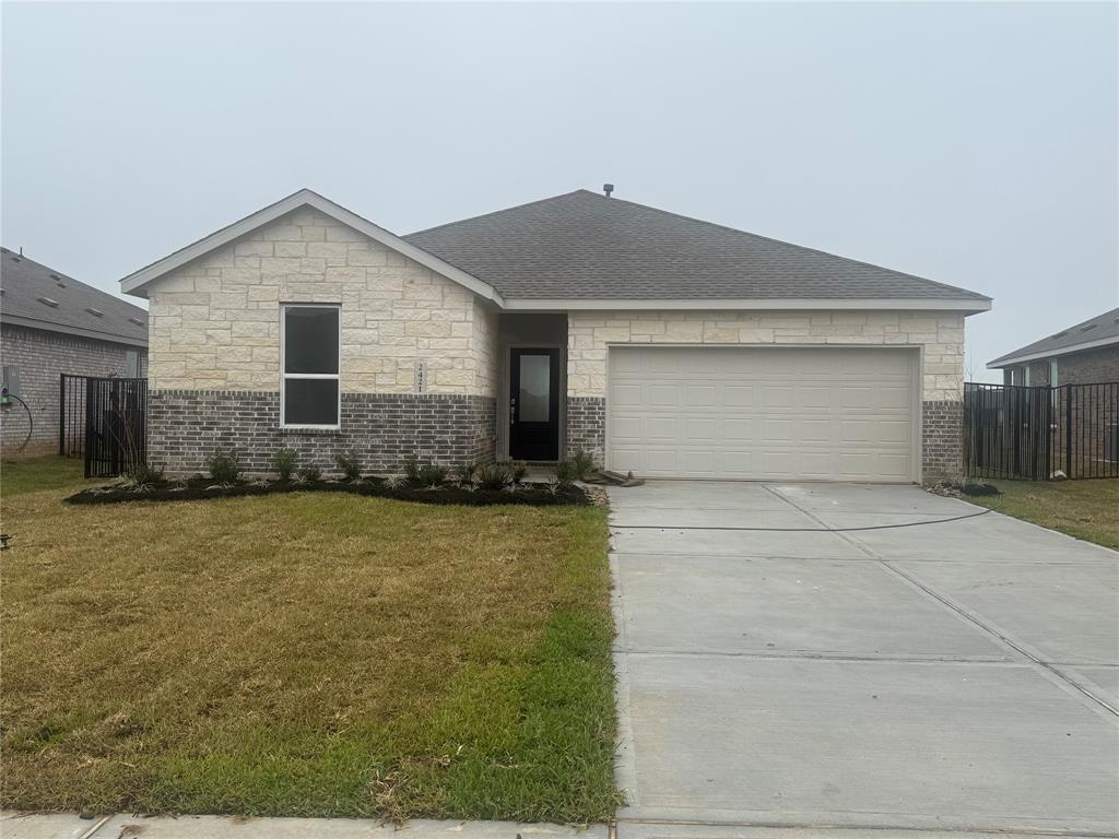 a front view of house with garage