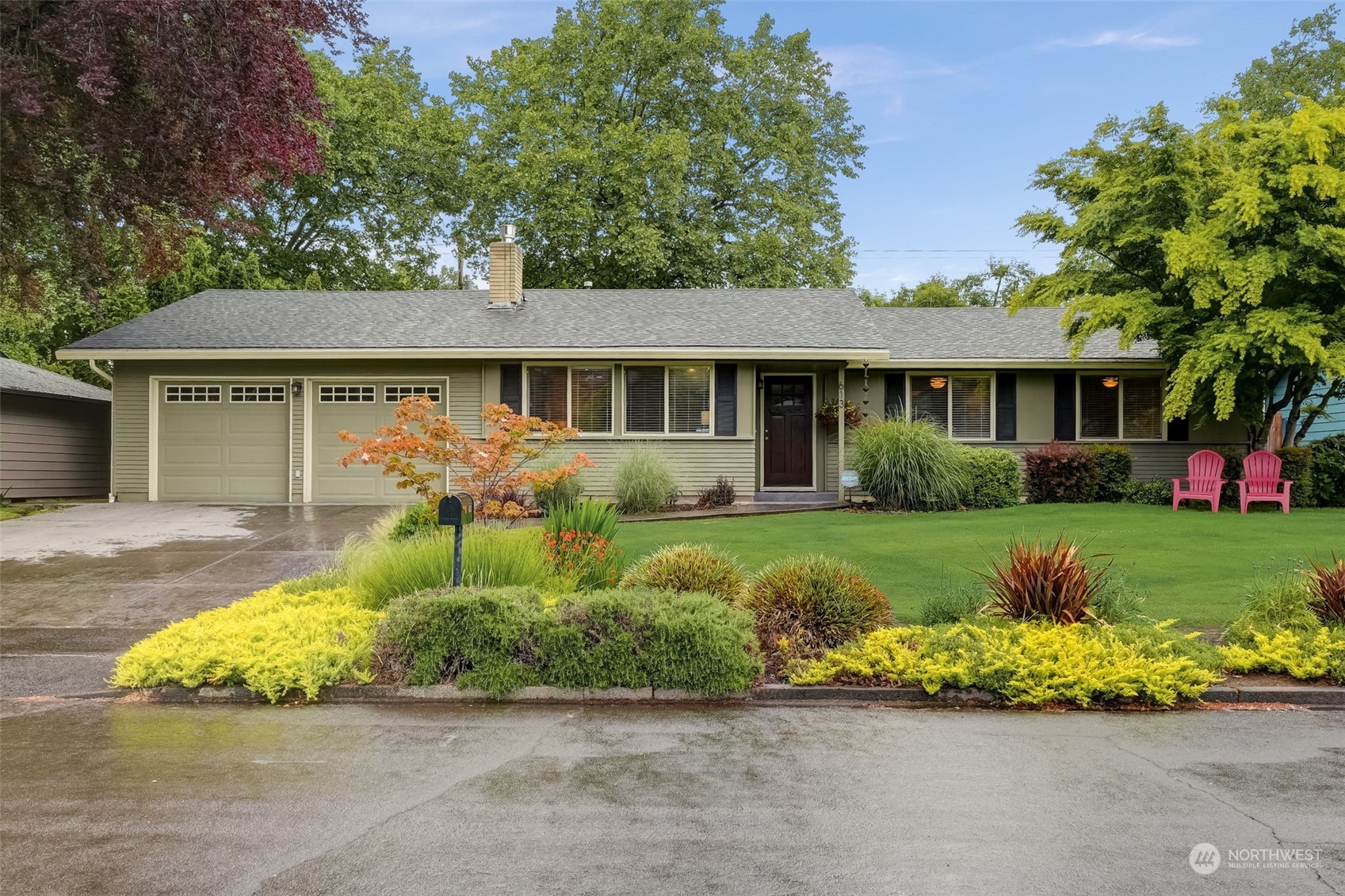 front view of a house with a yard