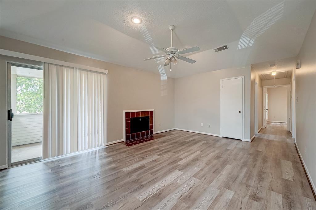 Hallway leads to 2 bedrooms and bath area