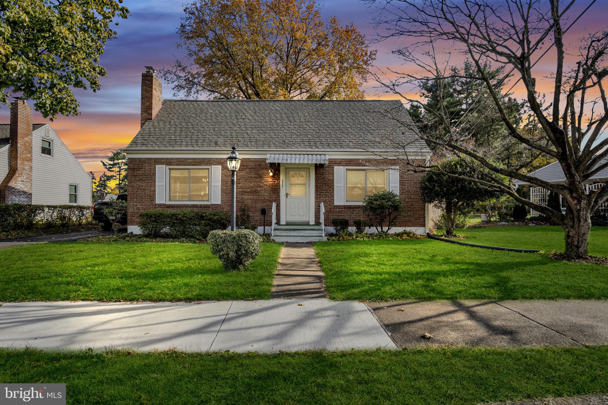 front view of a house with a yard