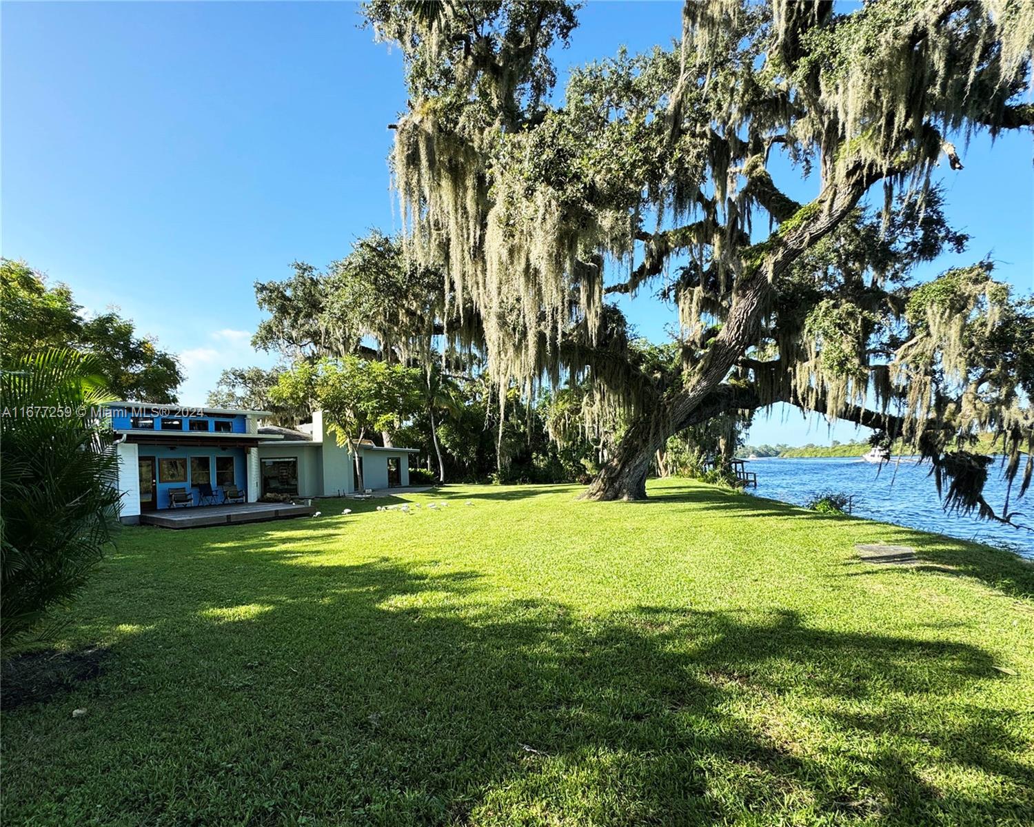 a view of a house with a big yard