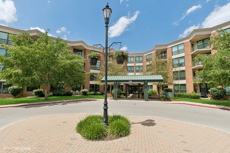 a view of a building with a street