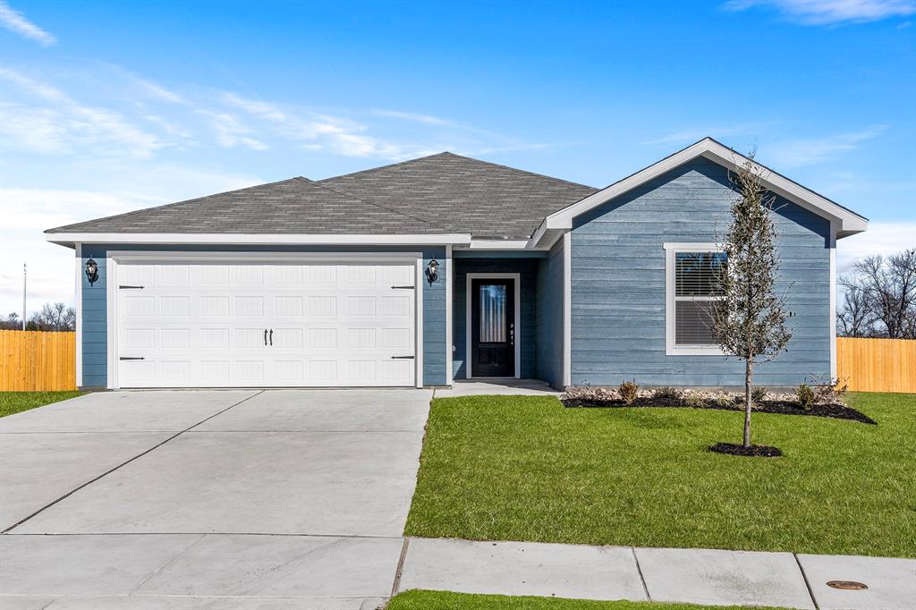 a front view of house with yard