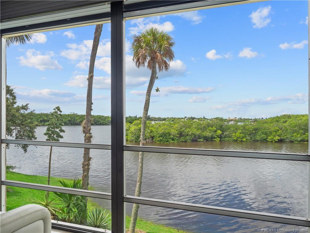 a view of a lake from a window