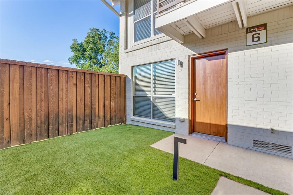 a view of backyard with cabin