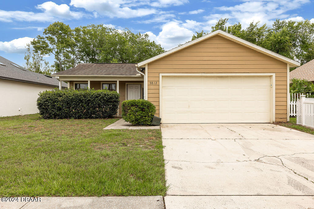 front view of a house and a yard