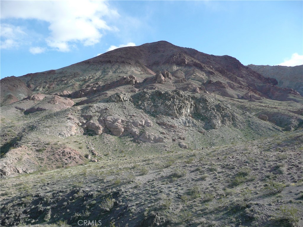 a view of mountains and valleys