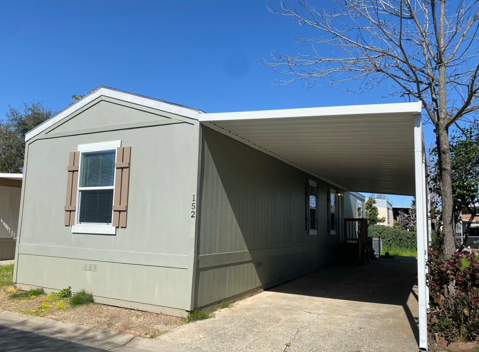 a view of a house with a garage