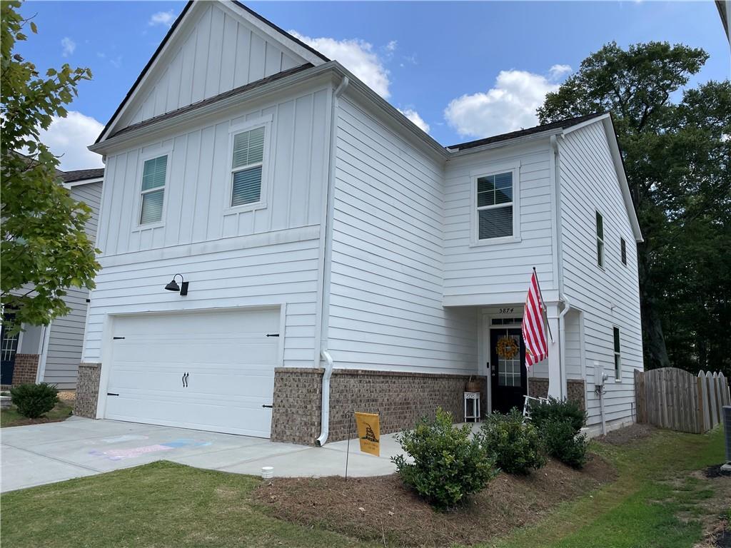 a front view of a house with a garage