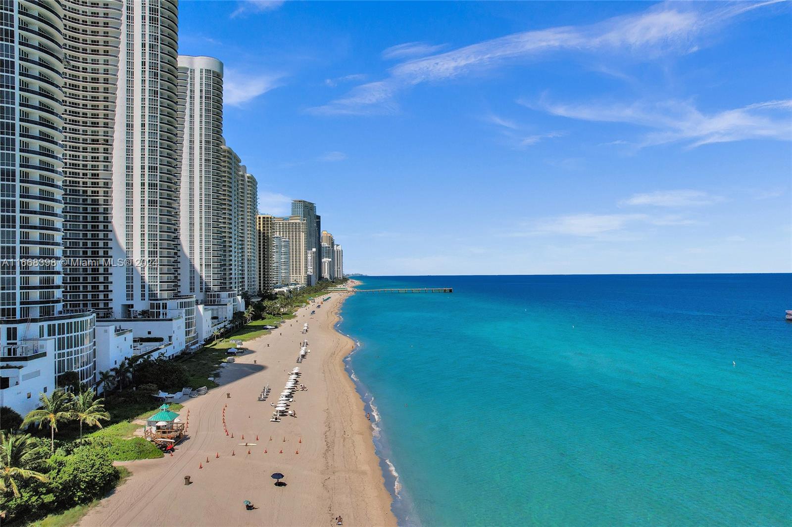 a view of a city with tall buildings