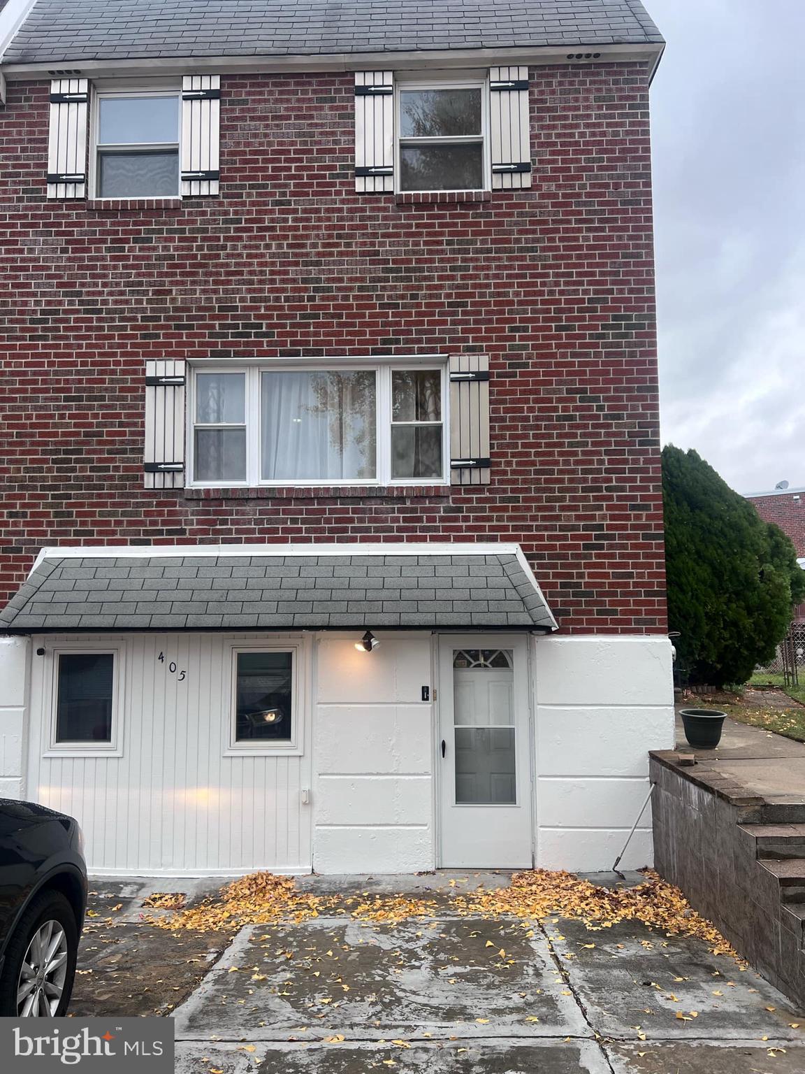 a front view of a house with a garage