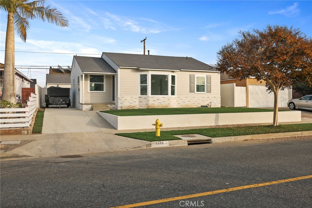 a front view of a house with street