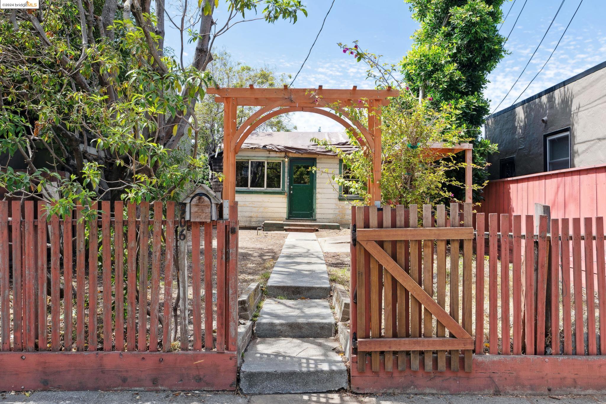 a view of a entrance gate of a house