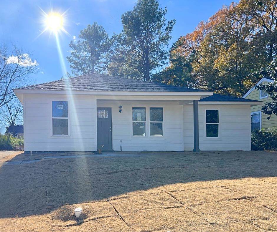 a front view of house with yard