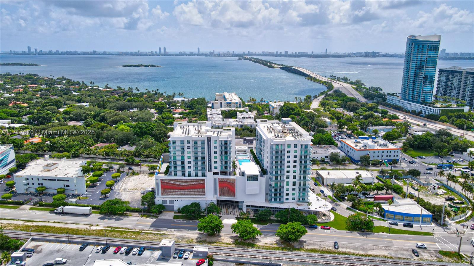 a view of city with ocean