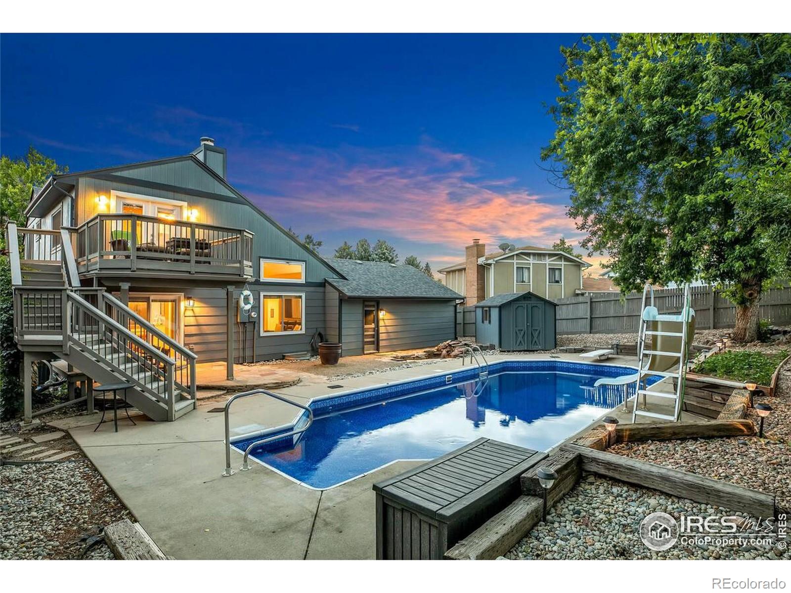 a house view with a sitting space garden and outdoor seating