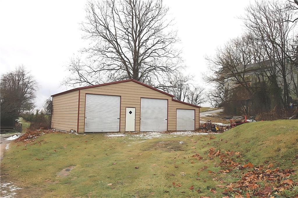 a house with yard covered in it