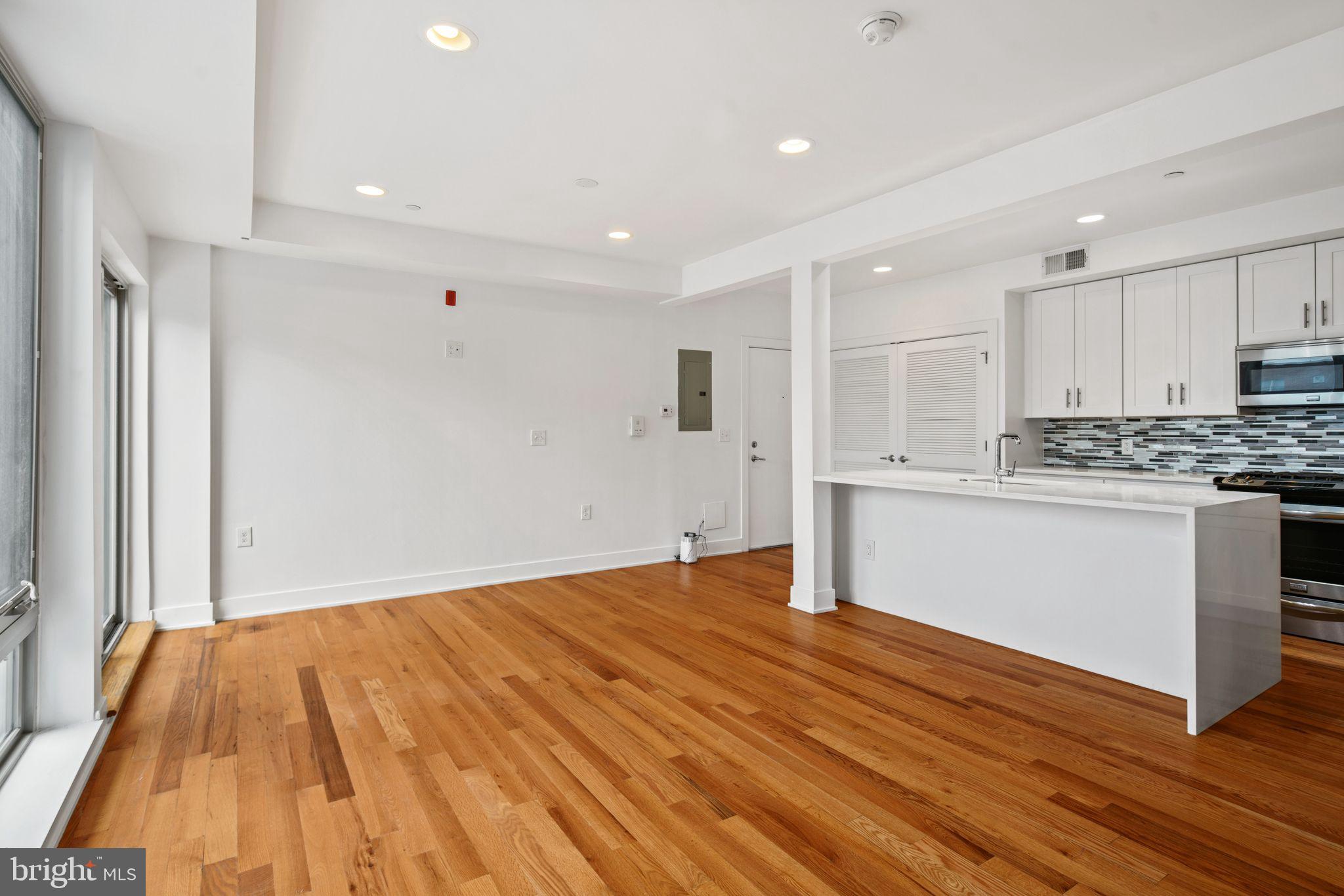 a view of kitchen with wooden floor