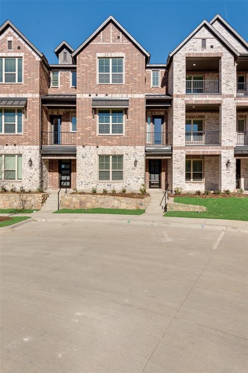 a front view of multi story residential apartment building