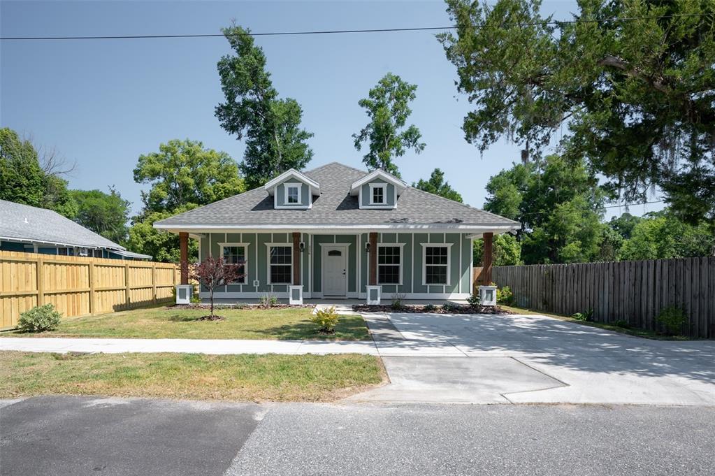 a front view of a house with swimming pool