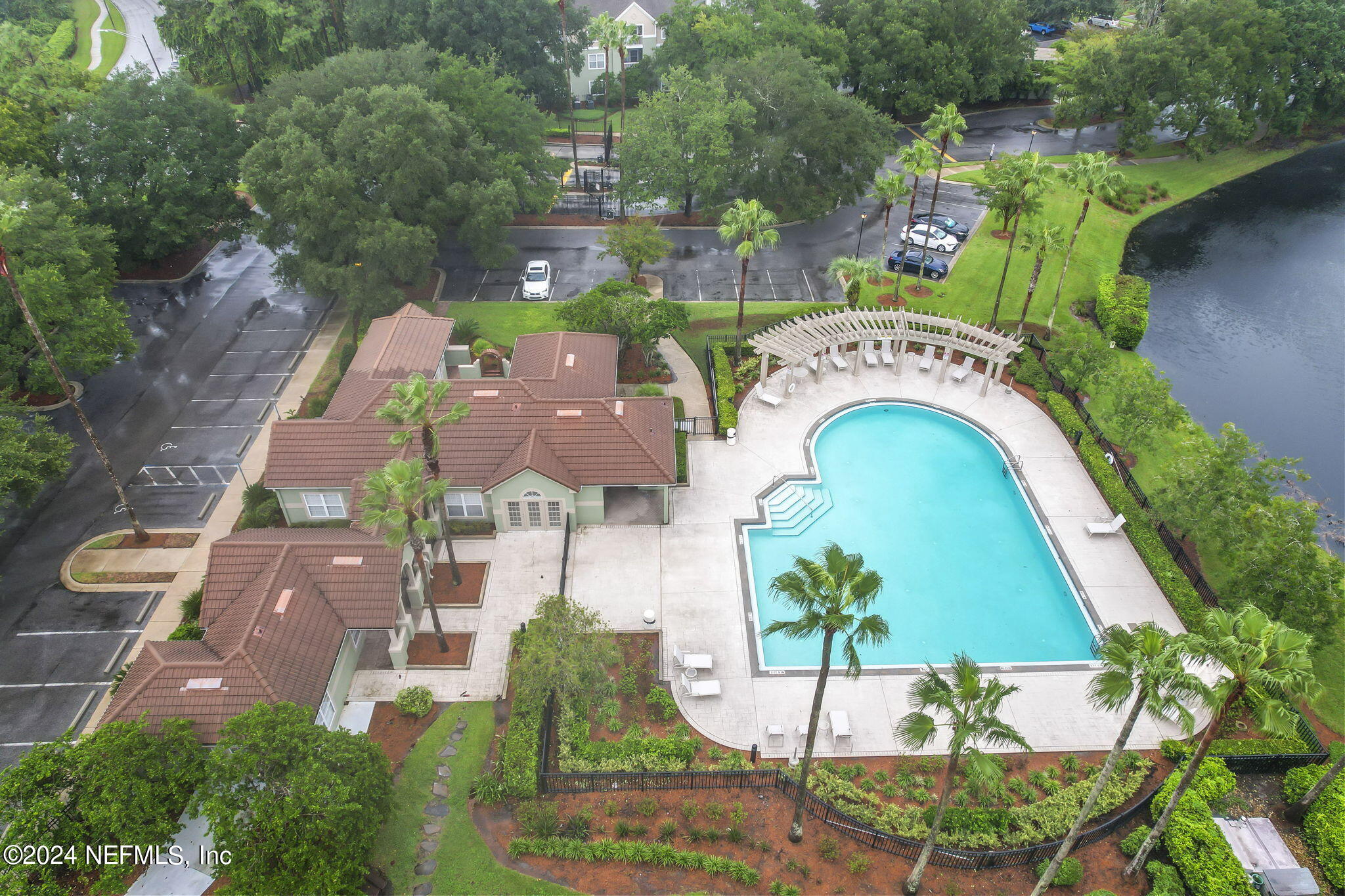 an aerial view of a house with a garden