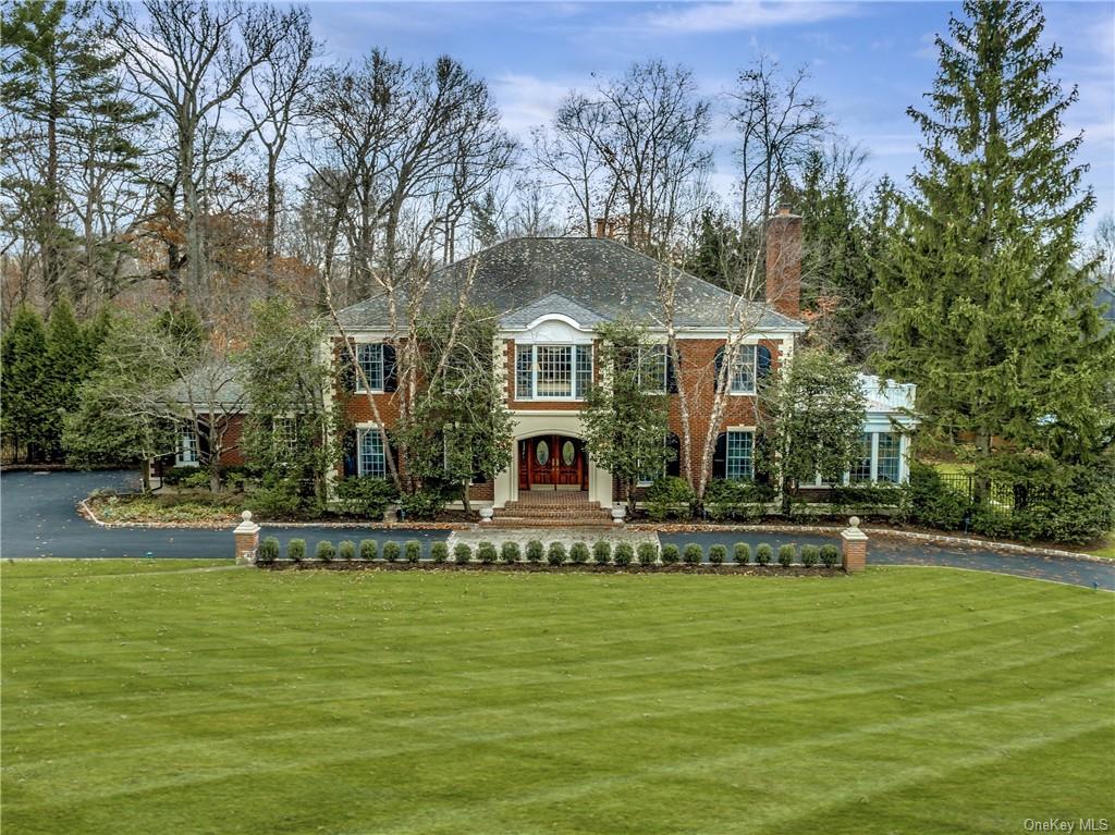 a front view of a house with a swimming pool