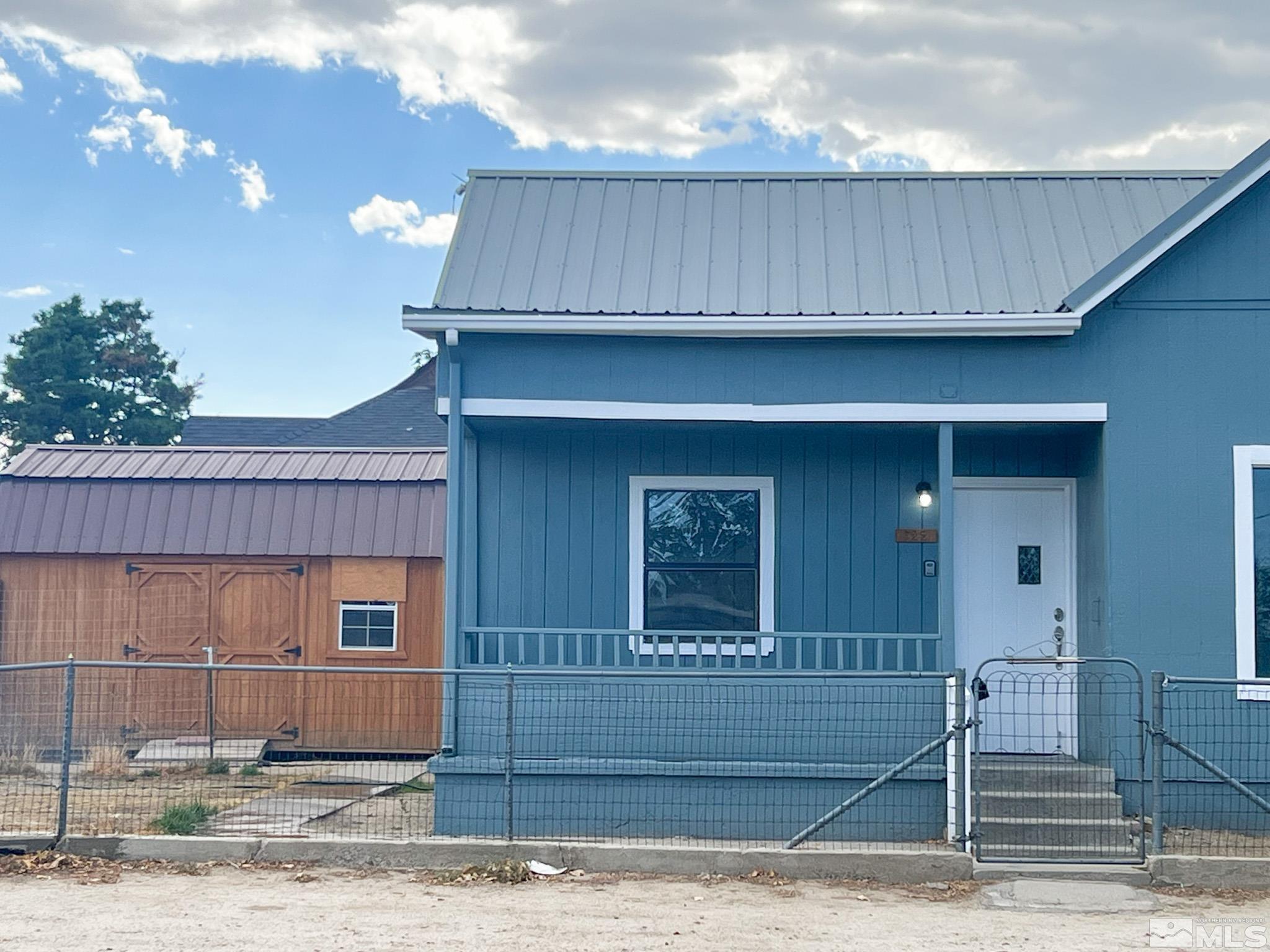 a view of a house with a patio