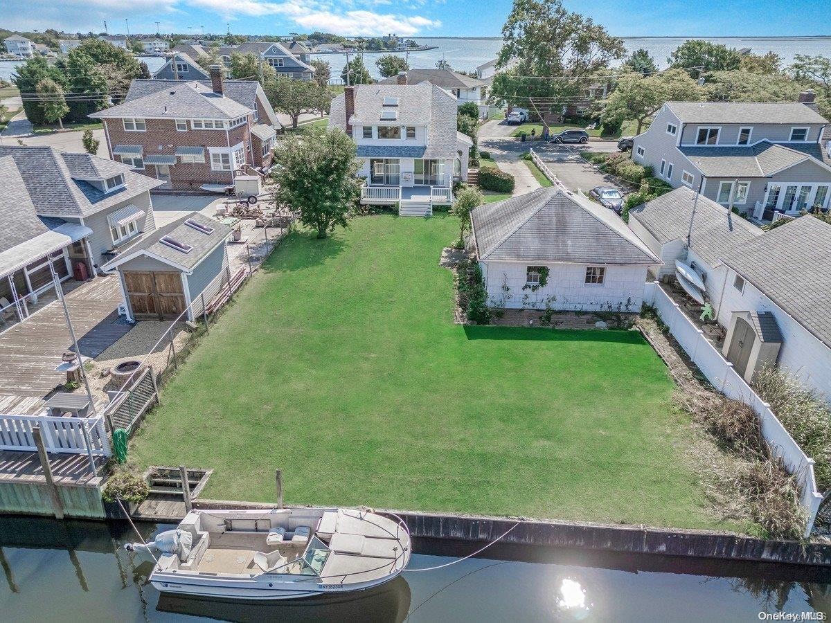 an aerial view of a house with a garden