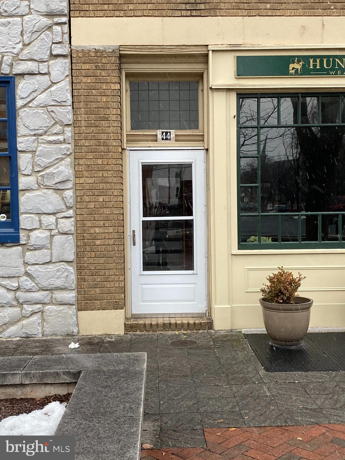 a view of entrance of the house and window