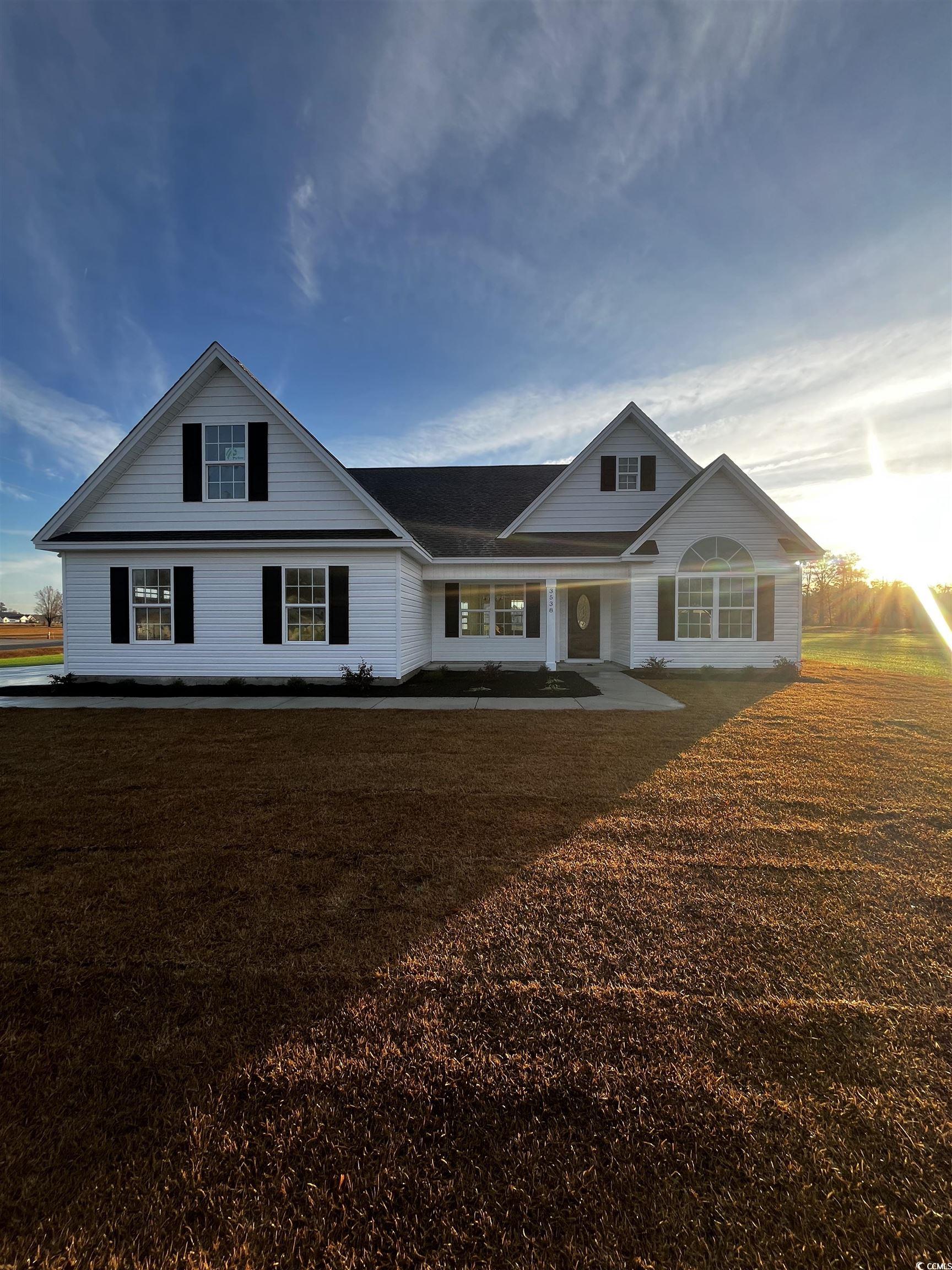 View of front of home featuring a front yard