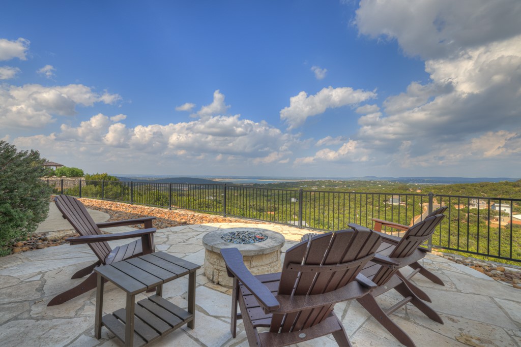 a view of a chairs and table on the terrace