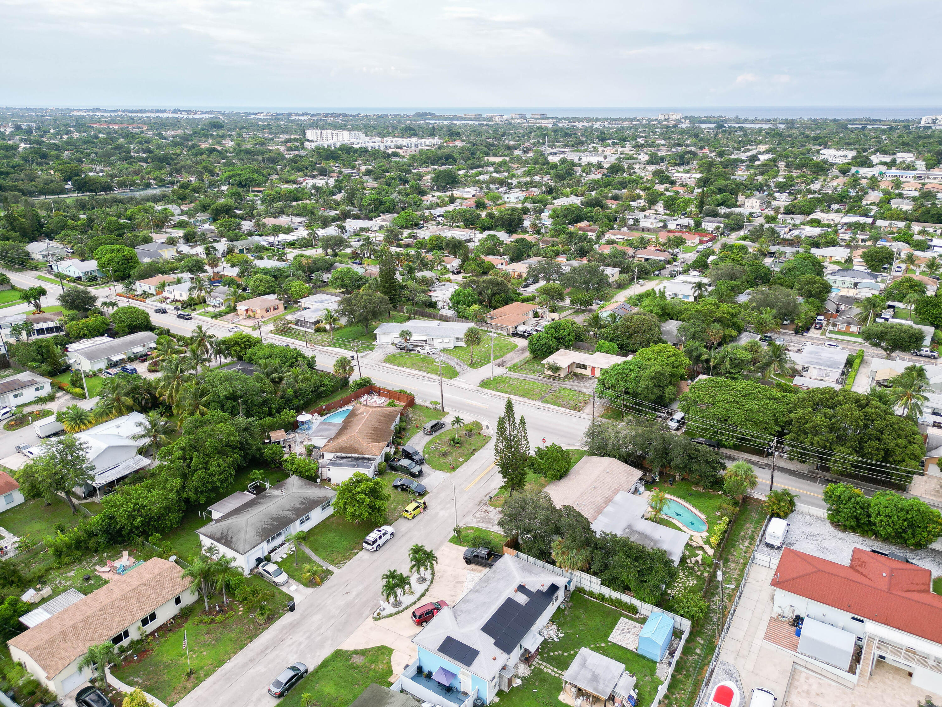 an aerial view of residential houses with outdoor space