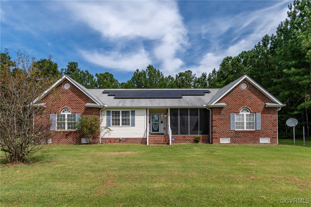 front view of a house with a yard