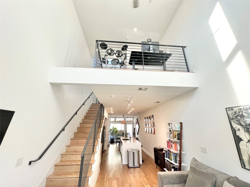 a view of kitchen and dining room with wooden floor