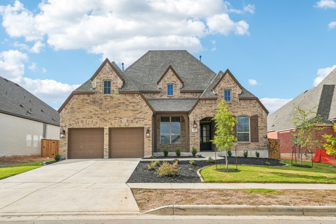 a front view of house with yard