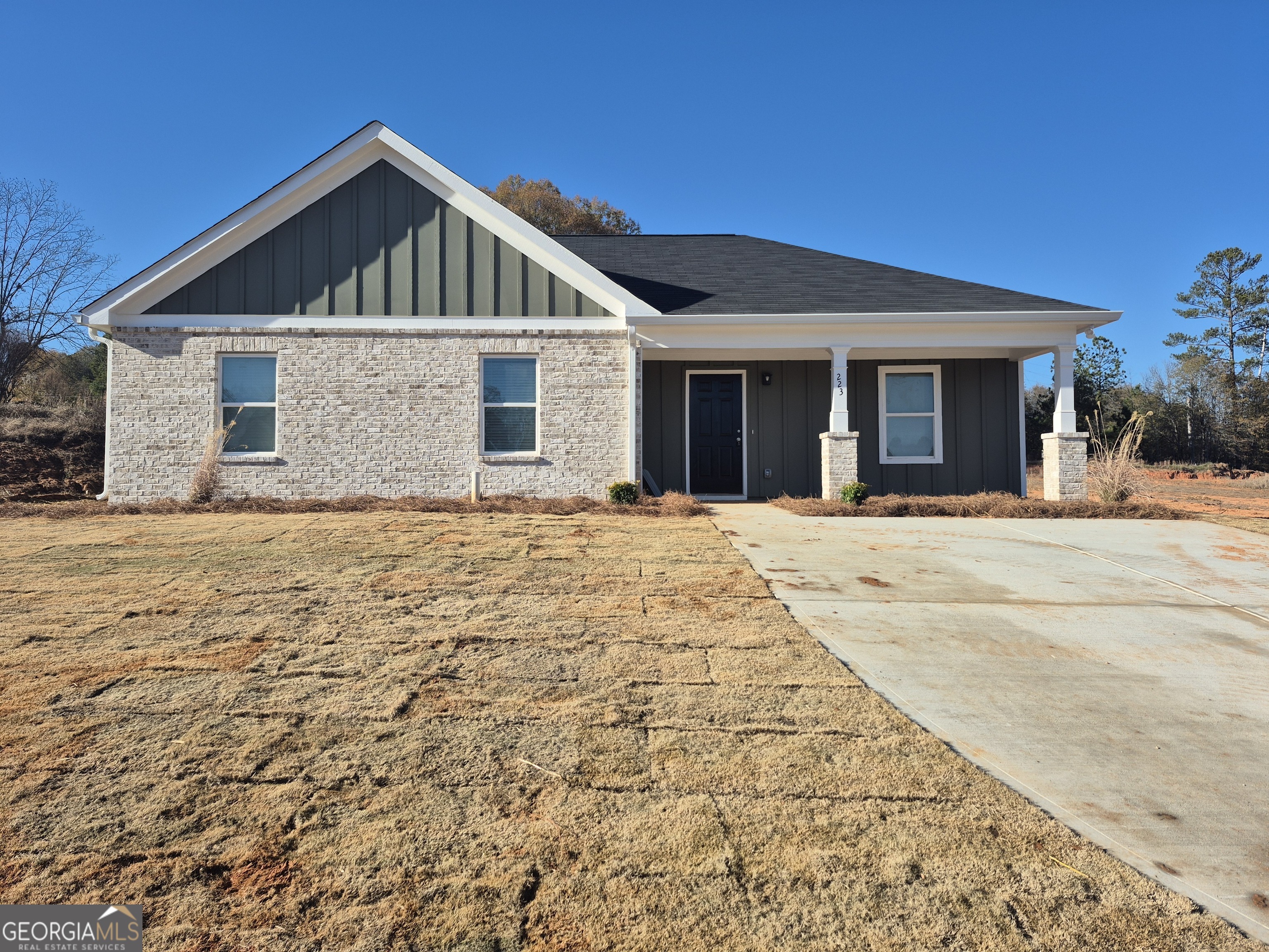 a front view of a house with a outdoor space