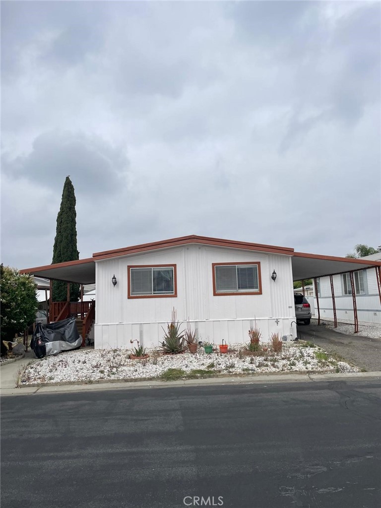 a front view of a house with yard