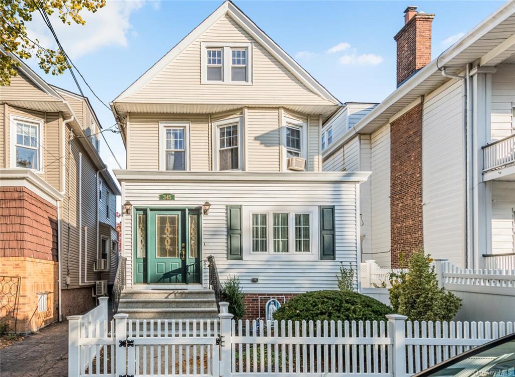 a front view of a house with a porch