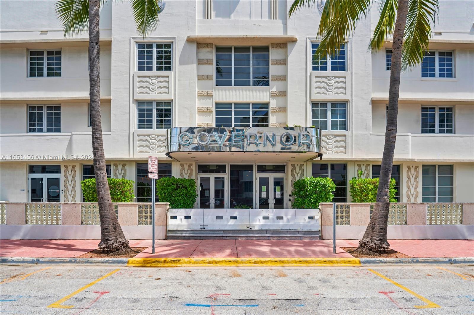 a view of a building with a swimming pool