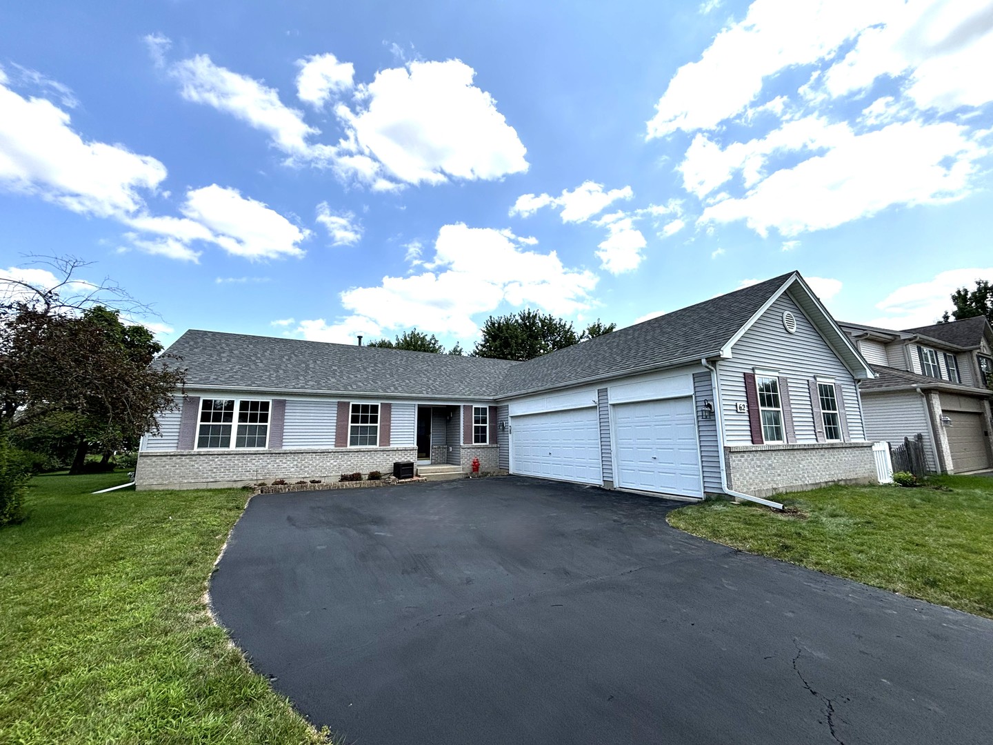 a view of outdoor space yard and front view of house