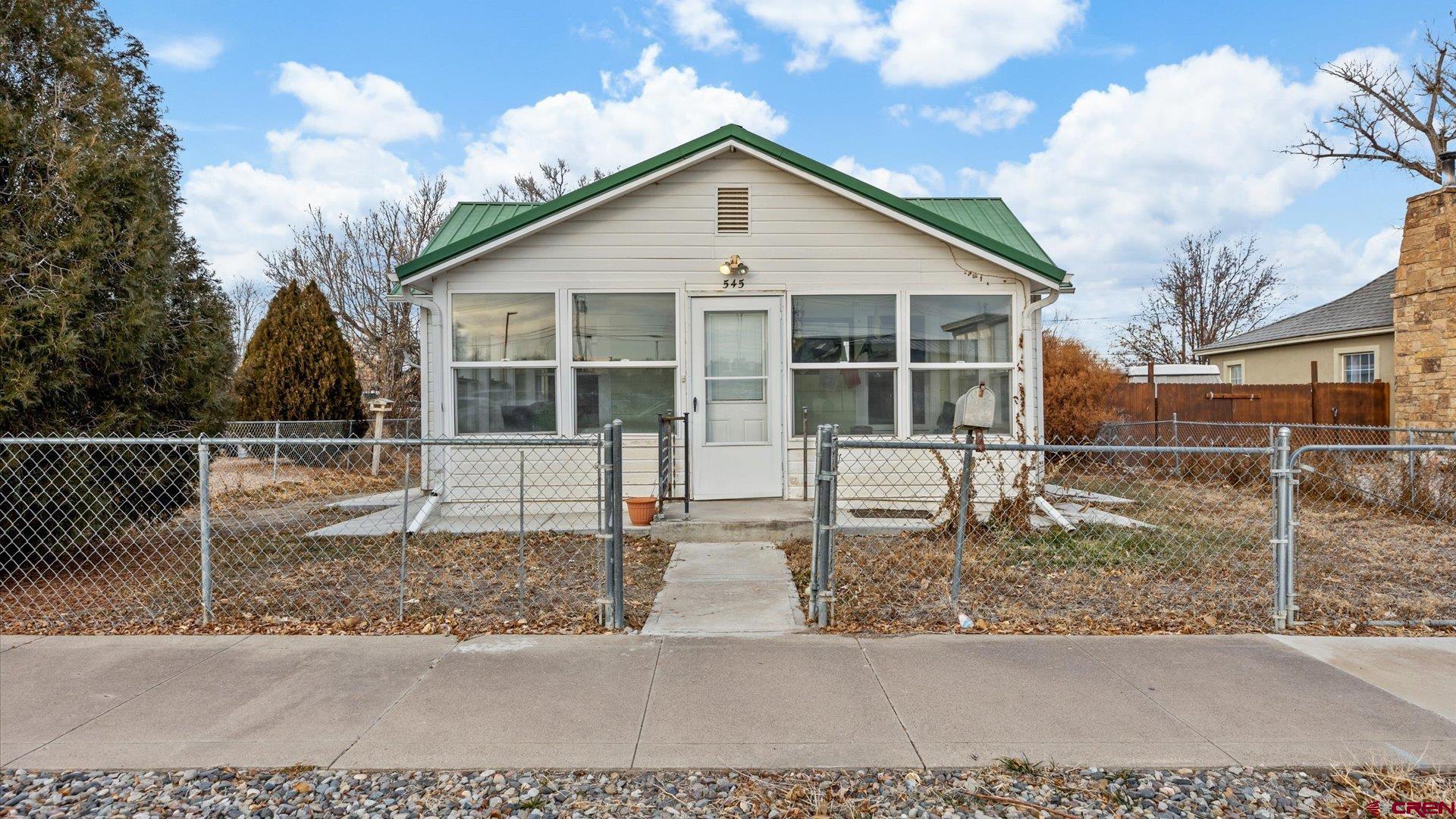 a front view of a house with a porch