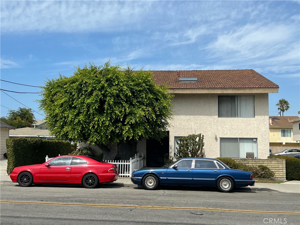 a car parked in front of a house